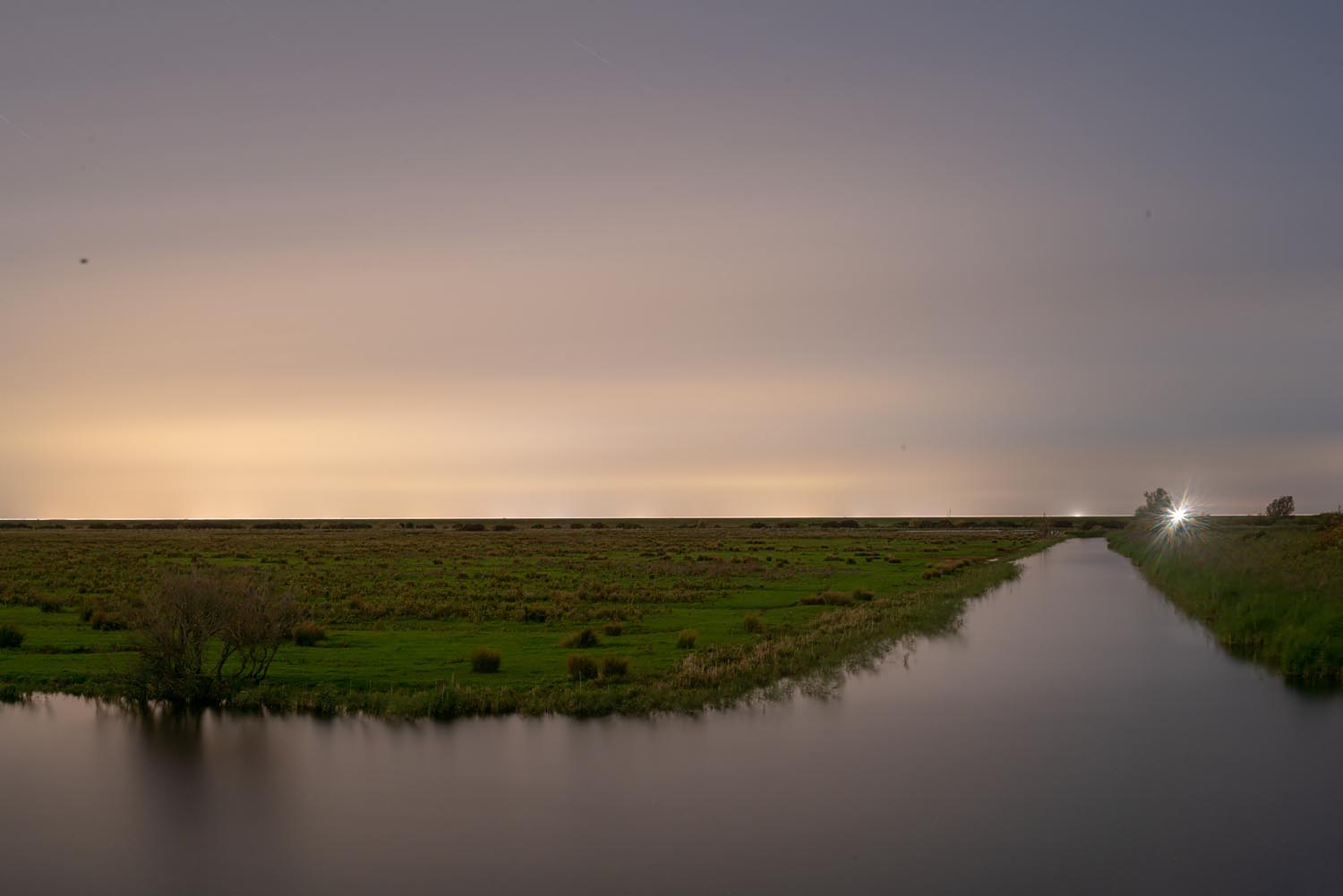 Sites at Risk of Climate Change: Night Landscape Photographs in The Netherlands, Steve Giovinco, Canal, Nieuw Land National Park, Clear Night, with Car Light Flevoland