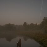 Sites at Risk of Climate Change: Night Landscape Photographs in The Netherlands, Steve Giovinco, Nieuw Land National Park, Locks in Fog with Plane Light in Sky, Frevoland