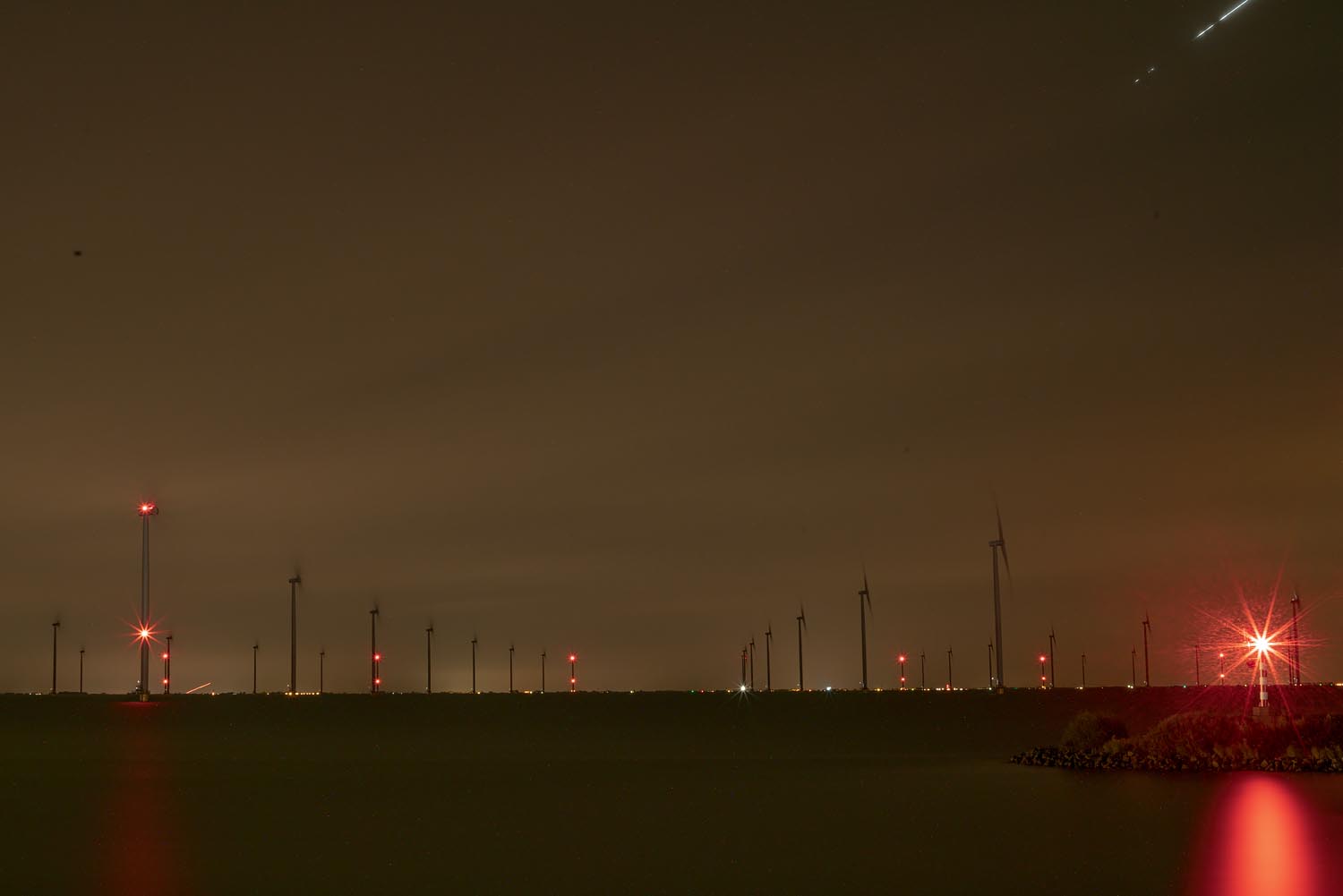 Sites at Risk of Climate Change: Night Landscape Photographs in The Netherlands, Steve Giovinco, Sustainable Energy, with Strange with Red Light and Line in Sky, Fryslan, Flevoland