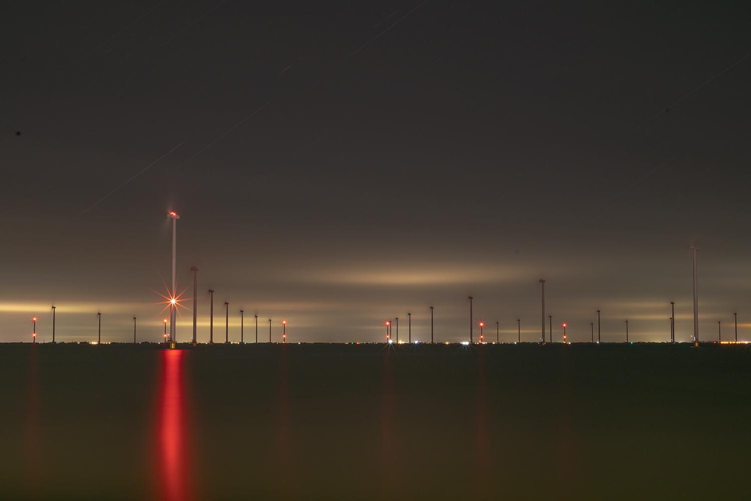 Sites at Risk of Climate Change: Night Landscape Photographs in The Netherlands, Steve Giovinco, Wind Farm Sustainable Energy with Glowing Red Light Fryslan, Flevoland