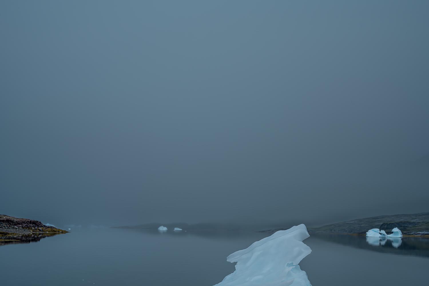 Shadow and Light: New Night Landscape Photographs of Greenland By Steve Giovinco. Iceberg Rainy Night