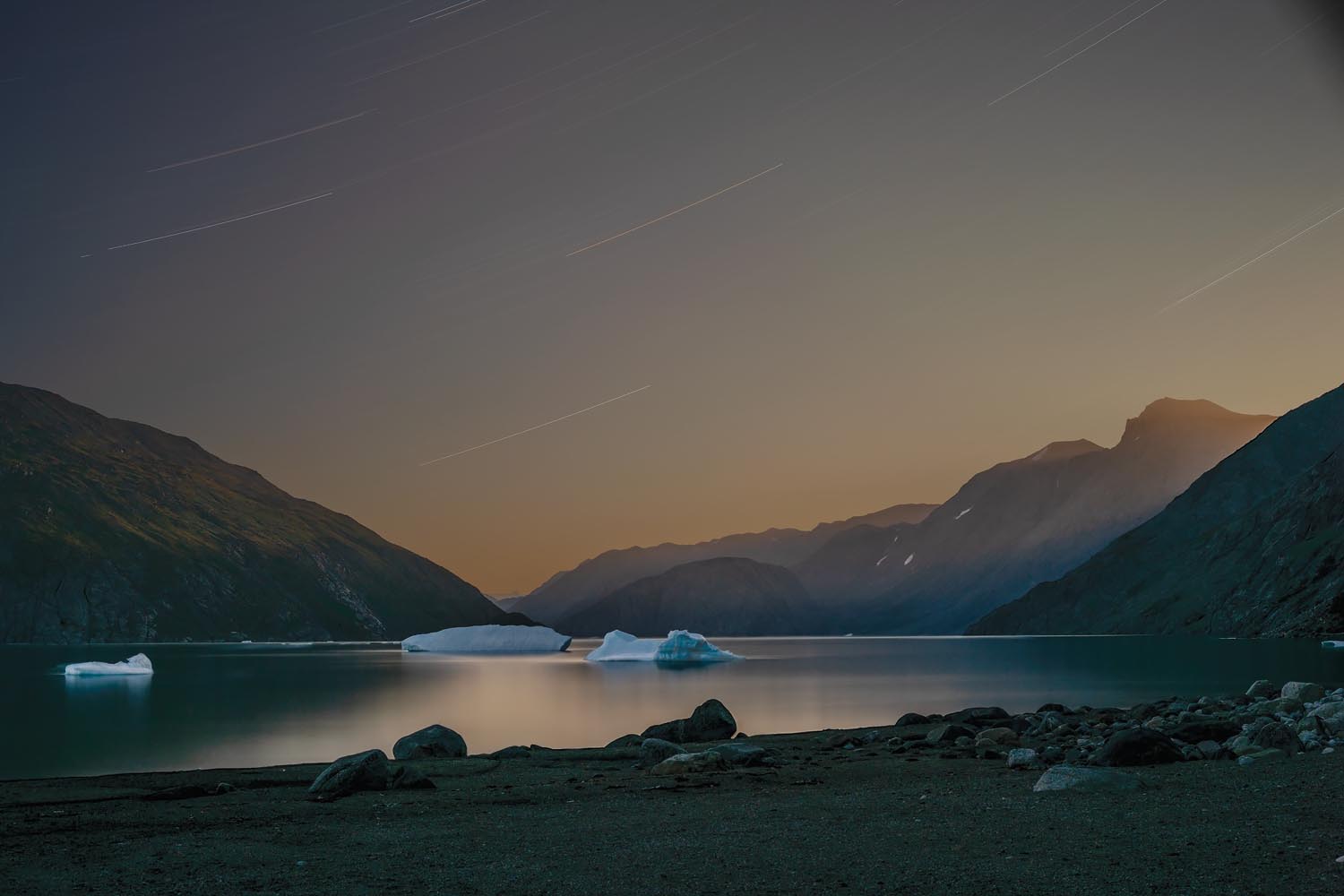Shadow and Light: New Night Landscape Photographs of Greenland By Steve Giovinco. Yellow Sky Over the Fjord