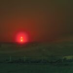 Shadow and Light: New Night Landscape Photographs of Greenland By Steve Giovinco. Red Glowing Light in Fog