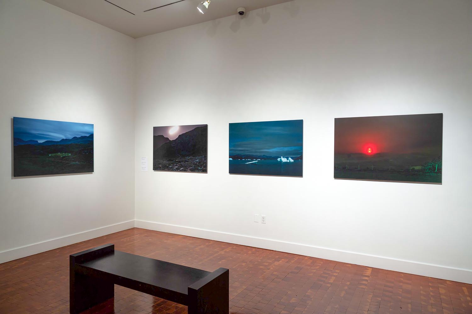 Arctic Edge, Photography Exhibition at Scandinavia House NYC, Night Landscape Photos of Greenland, By Steve Giovinco in Gallery Space with Bench Installation photo by Eileen Travell.